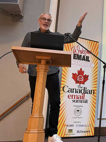 Speaker at a podium at The Canadian Email Summit
